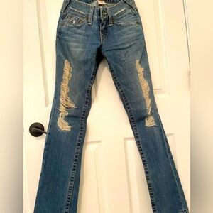 Women's distressed True Religion jeans